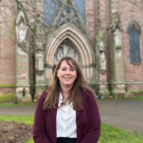 An Image showing Emma Roddick MSP standing in front of Inverness Cathedral